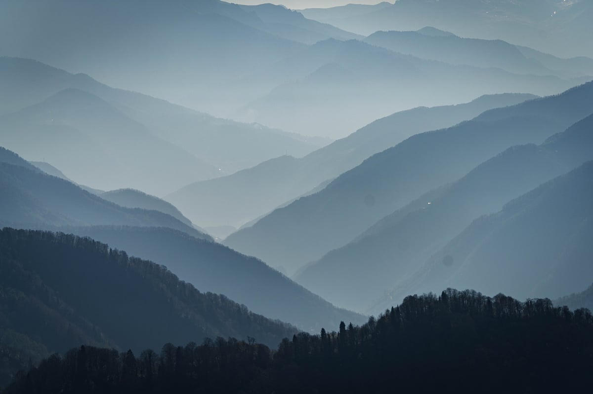 Layered Mountain Ridges in Misty Light. High quality photo
